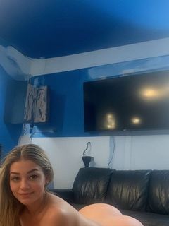 naked blonde woman in her own house